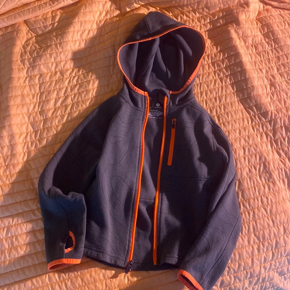 Cute hooded jacket with thumb holes.